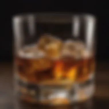 Close-up of a whiskey glass with amber liquid