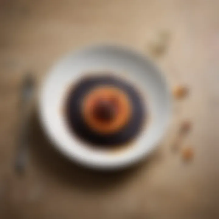 An elegant plate drizzled with VSOP balsamic vinegar alongside fresh ingredients