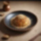 A beautifully arranged plate of Ariselu topped with sesame seeds