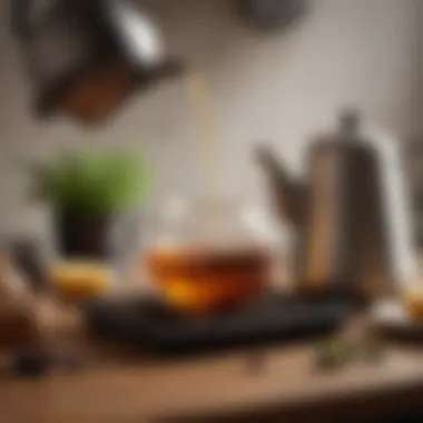 A cup of brewed tea beside the Balmuda Tea Kettle, emphasizing the brewing experience