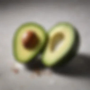 Sliced Avocado for Low Carb Diet Sliced avocado with a sprinkle of salt and pepper