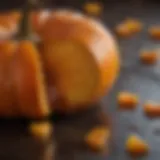 A vibrant display of candied pumpkin pieces glistening with syrup