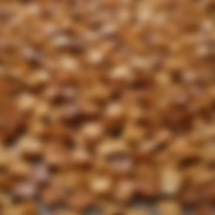 A golden-brown tray of freshly baked Chex Mix cooling on a counter