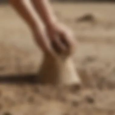 Close-up of cleaning putty removing dirt from a surface