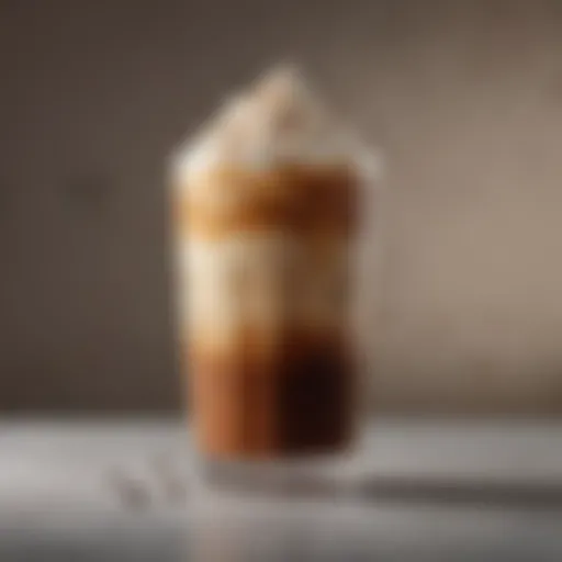 A glass of iced coffee with rich layers of cream and coffee