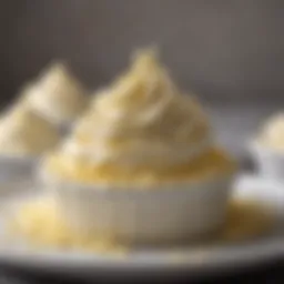 A creamy bowl of butter cream frosting with a smooth texture