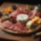An elegant arrangement of cured meats and artisanal cheeses on a wooden board