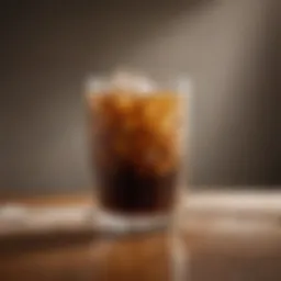 Freshly brewed iced coffee in a glass with ice cubes