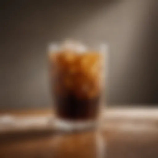 Freshly brewed iced coffee in a glass with ice cubes