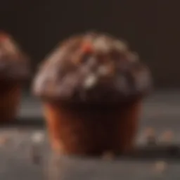 Close-up of the rich chocolate muffin showcasing its texture and ingredients.