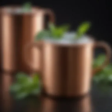 Classic Mule Drink in a Copper Mug Chilled copper mug with a mule drink garnished with mint leaves