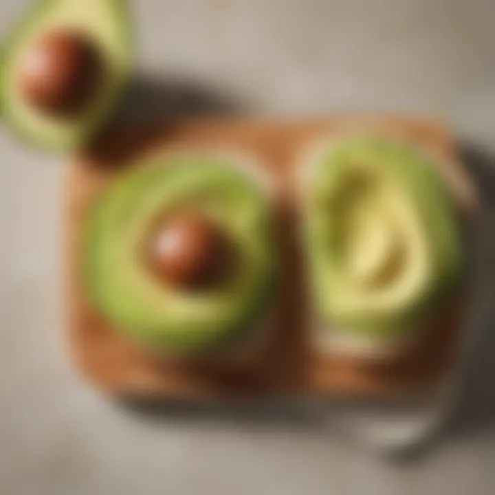 Spoonful of avocado spread on a slice of bread