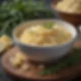 A close-up view of non-dairy parmesan cheese granules in a bowl surrounded by fresh herbs.