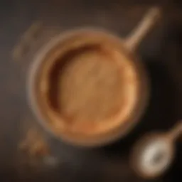 Whole wheat flour in a rustic bowl with a wooden spoon