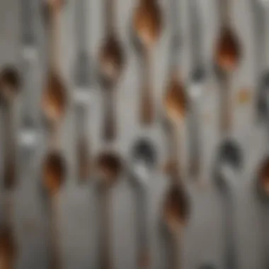 An array of spoons in different materials and designs.