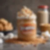 A close-up view of a creamy peanut butter jar alongside a fluffy marshmallow spread.