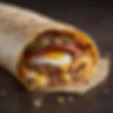 Close-up view of the McDonald's Breakfast Wrap showcasing its vibrant ingredients