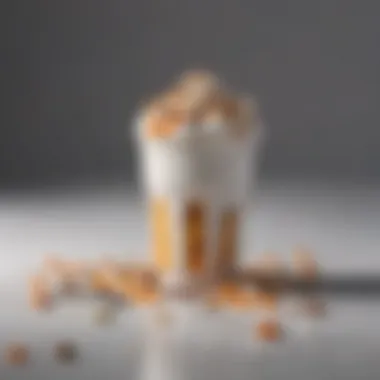 A visually appealing presentation of a Mini McFlurry with a spoon ready for enjoyment.