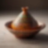 Artisan-crafted small tagine pot showcasing intricate designs