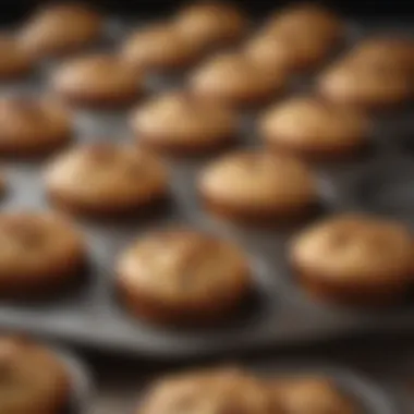 Baking muffins in metal pans with golden-brown tops