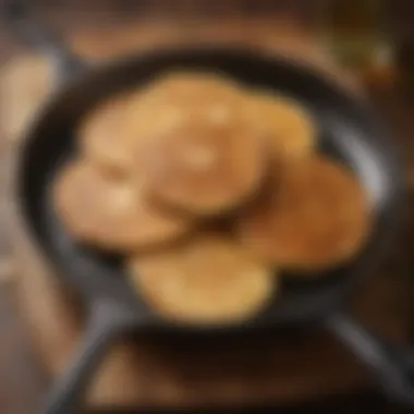 Perfectly Golden Vegetarian Pancakes A close-up of a frying pan with golden-brown vegetarian pancakes sizzling and ready to be flipped