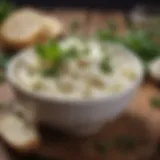 A bowl of creamy ricotta cheese with herbs