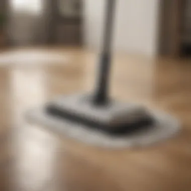 A hybrid cleaning tool combining vacuum and mop features in action