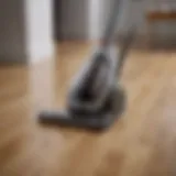 A sleek modern vacuum cleaner on a polished hardwood floor