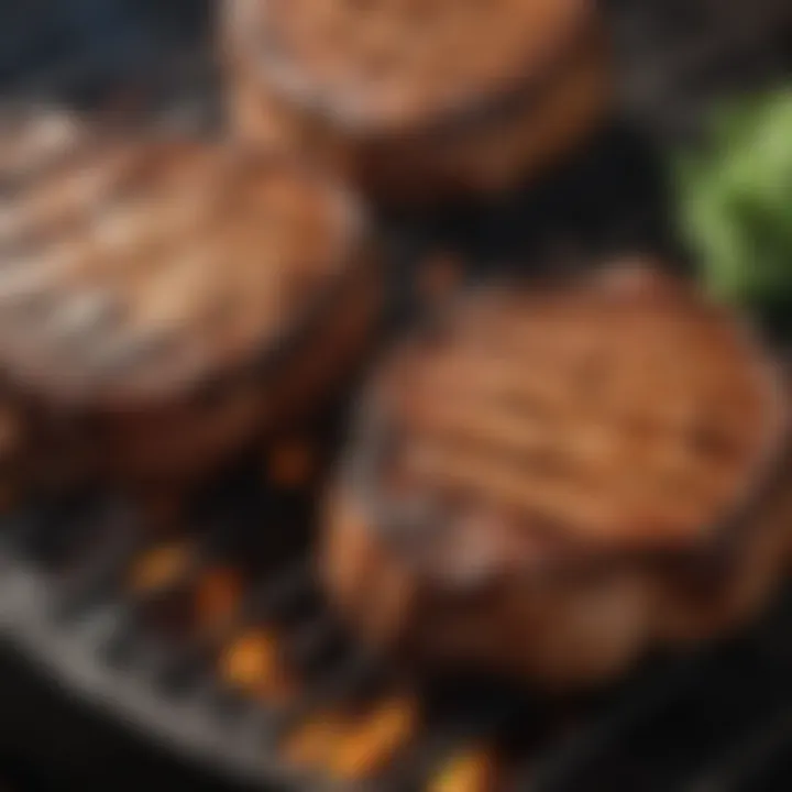 Close-up of grilling butterflied pork chops over charcoal