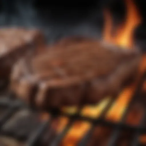 Sizzling steak on the grill with flames