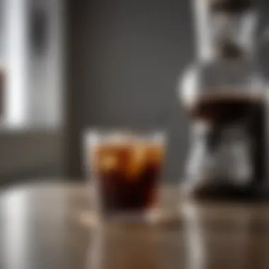 Demonstration of cold brew coffee being served in a stylish glass