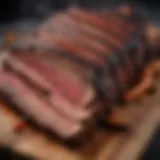 Close-up view of beautifully smoked beef ribs on a wooden board