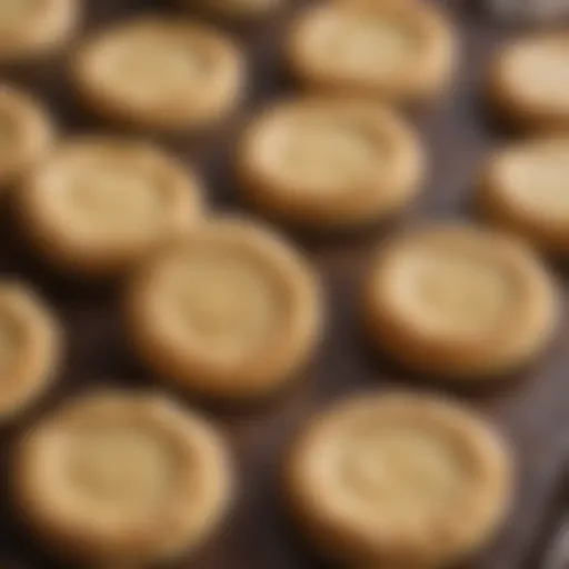 A close-up view of perfectly baked Mrs. Fields butter cookies showcasing their golden-brown edges and soft centers.