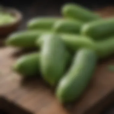 Close-up of fresh organic seedless cucumbers on a wooden table