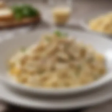 Elegant Presentation of Fettuccine Alfredo A beautifully plated dish of fettuccine with chicken alfredo sauce