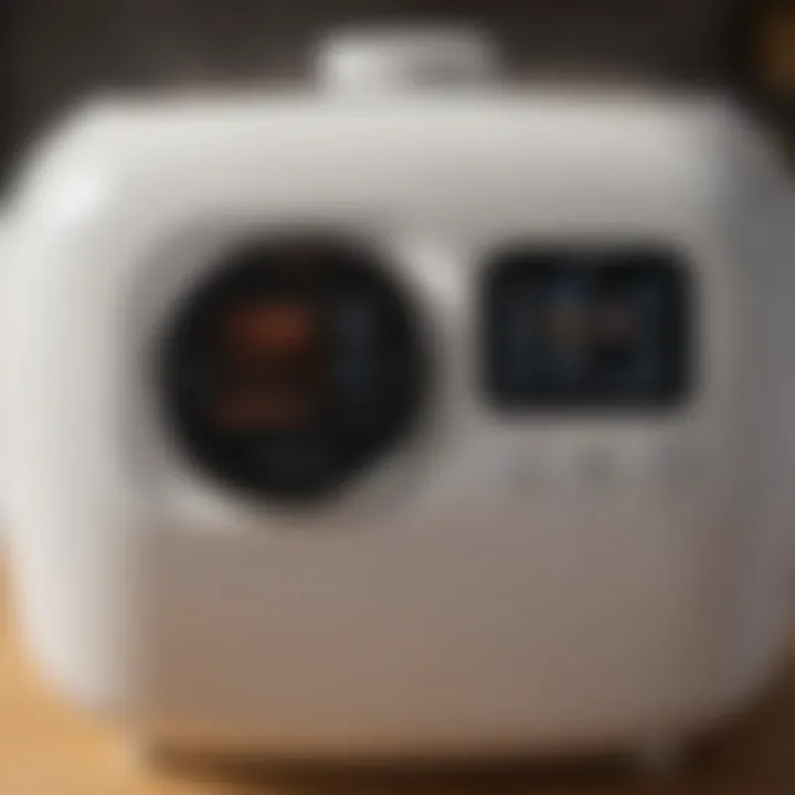 A close-up of a rice cooker displaying its digital control panel.