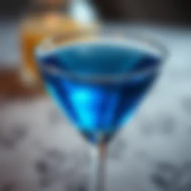 Captivating Blue Hue of the Sapphire Martini A close-up of a Sapphire Martini with a shimmering blue hue