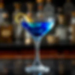 A beautifully crafted Sapphire Martini garnished with a twist of lemon