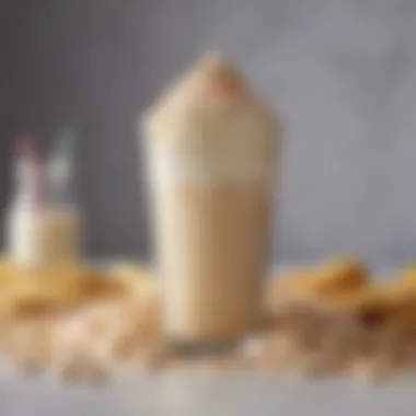Essentials for the Perfect Cake Batter Shake An artistic arrangement of the ingredients used in the cake batter shake, including cake mix and whipped cream.