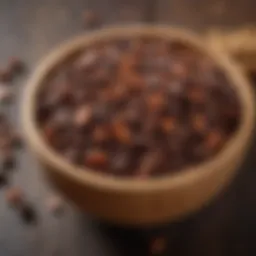 Close-up of sweetened cacao nibs nestled in a wooden bowl