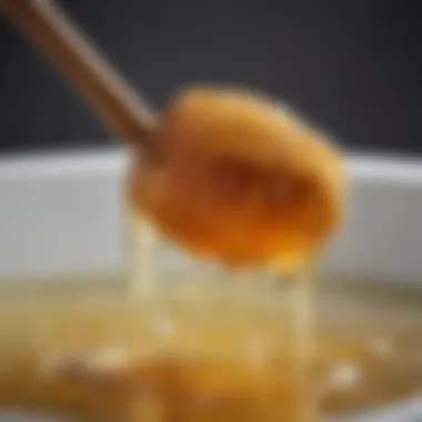 Honey being gently heated in a warm water bath