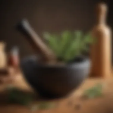 A wooden mortar and pestle with rosemary leaves