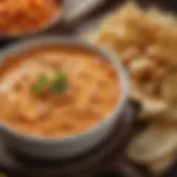 A close-up of creamy buffalo chicken dip in a rustic bowl